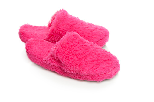 Pink  slippers on a white background