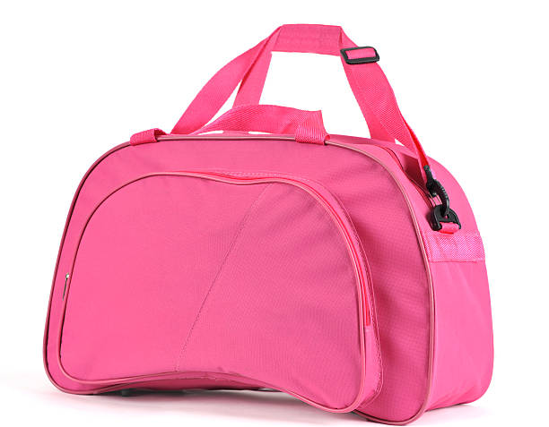 A pink sport bag on a white background stock photo