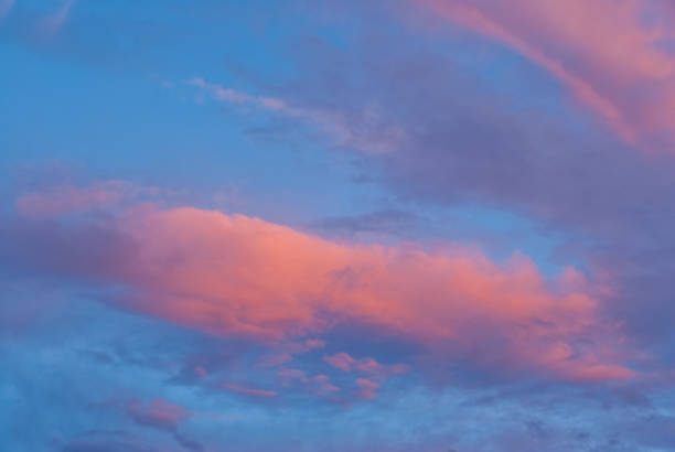 Pink Sunset Background This pink sunset background was photographed over Mountainaire near Flagstaff, Arizona, USA. jeff goulden sunset background stock pictures, royalty-free photos & images