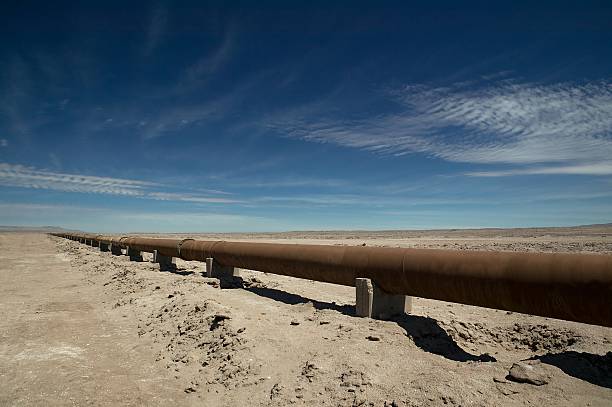 Pipeline through a desert stock photo