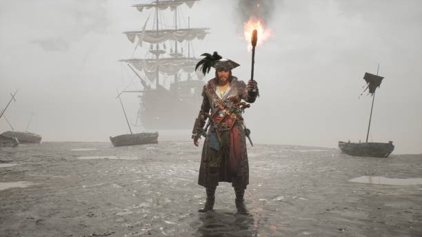 A pirate walks with a torch on a misty deserted island. The man was created using 3D computer graphics. 3D rendering. The concept of maritime adventure. The image is ideal for pirate backgrounds. stock photo