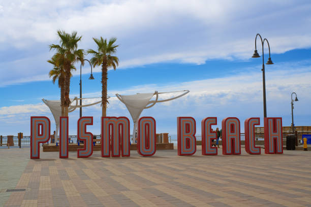 Pismo Beach Pier plaza. The large light-up letters, a new neon landmark of Pismo Beach city, California stock photo