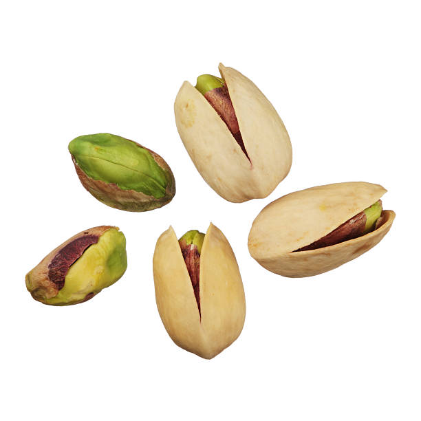 Pistachios nuts isolated on white background, close up Pistachios nuts isolated on white background, close up pistachio stock pictures, royalty-free photos & images