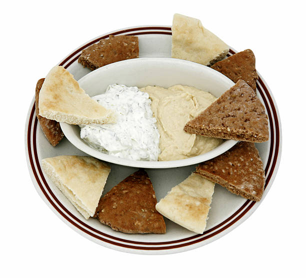 Pita Bread with hummus and tzatziki stock photo