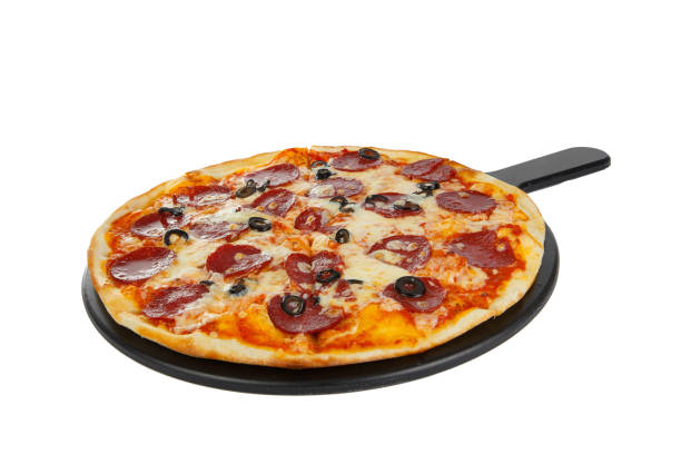 pizza on white board isolated white stock photo