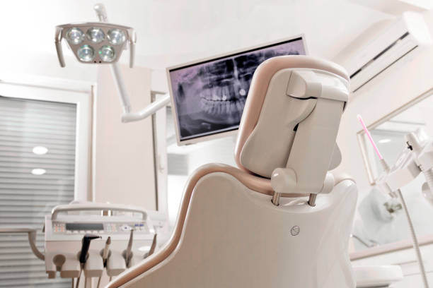 Place for beautiful smile Modern dentist office. Place for beautiful smile. Modern dental practice. Dental chair and other accessories used by dentists general view stock pictures, royalty-free photos & images