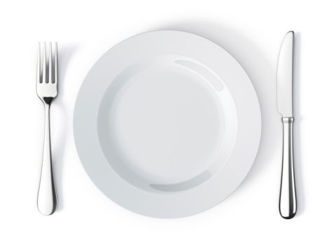 Top view of place setting with plate, knife and fork
