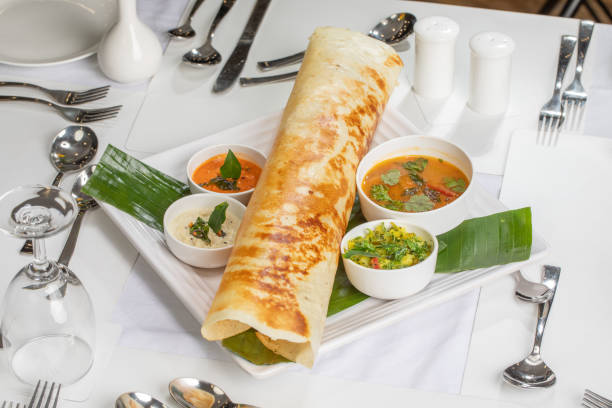 Plain Dosa Dish indian street food plain dosa from south indian cuisine thosai stock pictures, royalty-free photos & images