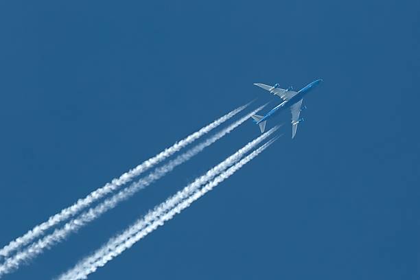 Plane at cruising altitude stock photo
