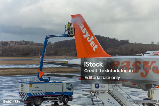istock planes ready tode-ice at edinburgh airport runway in scotland england UK 1146014734