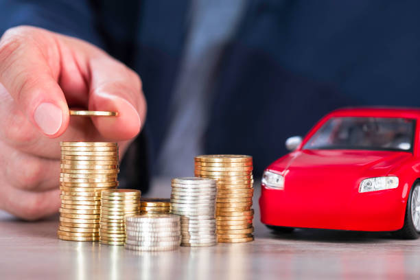 planning kopen auto besparing-eigendom van de auto - taxes stockfoto's en -beelden