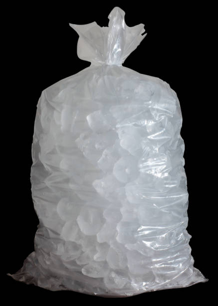 Plastic bag with ice and black background stock photo