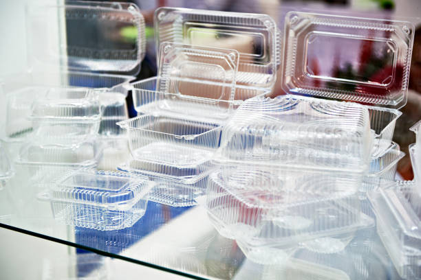 Plastic disposable food containers Plastic disposable food containers in showcase of shop disposable stock pictures, royalty-free photos & images