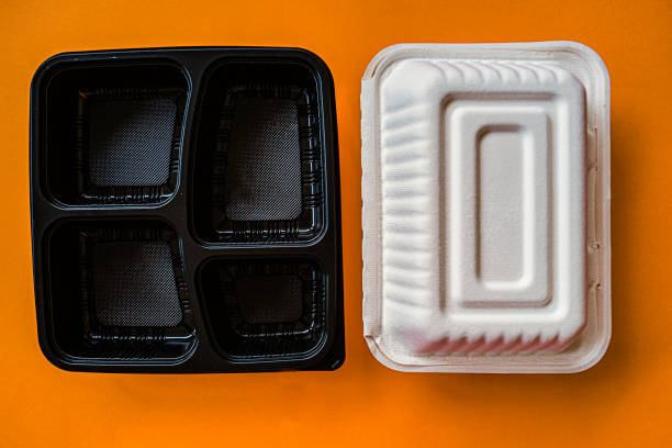 Plastic or Paper for to-go container ? stock photo