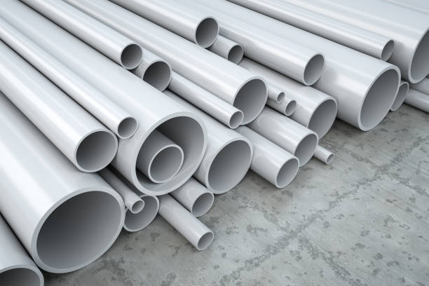 plastic pipes An image of some plastic pipes in a warehouse pvc stock pictures, royalty-free photos & images
