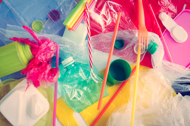 Plastic waste background Various colorful plastic products disposable stock pictures, royalty-free photos & images