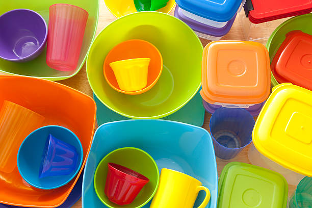 Plasticware Top view of lots of plastic kitchen utensils, mostly containers plastic container stock pictures, royalty-free photos & images