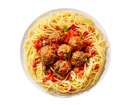 plate of pasta with meatballs isolated on white background, top view