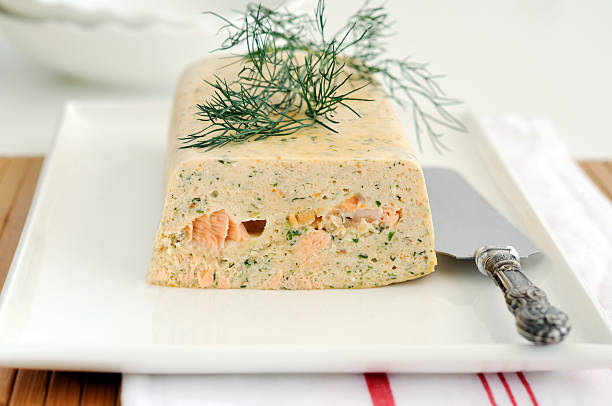 Plated fresh and smoked salmon terrine Fresh and smoked salmon terrine garnish whith dill pate stock pictures, royalty-free photos & images