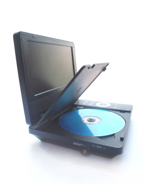 DVD player DVD is set in the DVD player. Portable DVD Player stock pictures, royalty-free photos & images