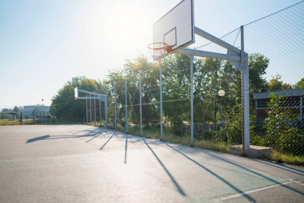 Playground In The Block Basketball courtyard in the city. courtyard stock pictures, royalty-free photos & images