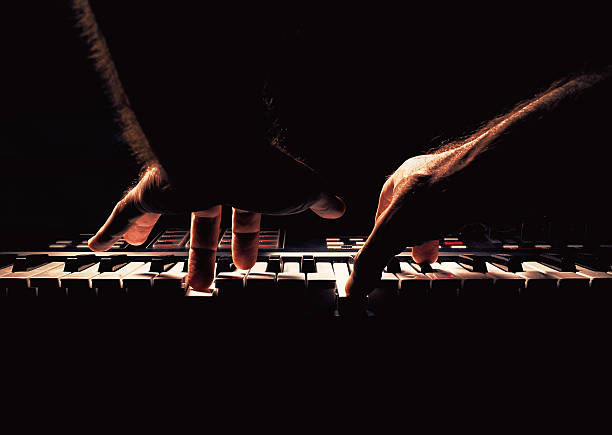 Playing a Piano or Synth stock photo