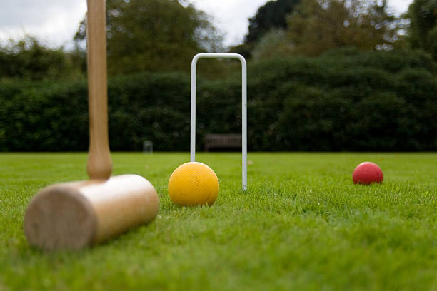 Playing croquet on an English lawn stock photo
