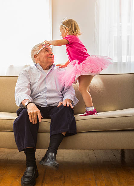tocar princesa com os avós - grandparents vertical imagens e fotografias de stock