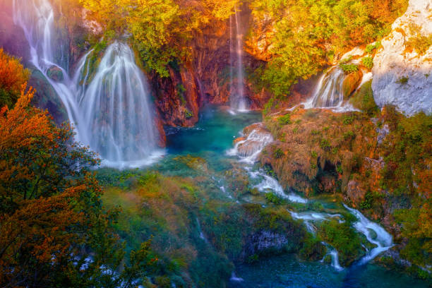 Plitvice Lakes cascades of waterfall, autumn scenery stock photo