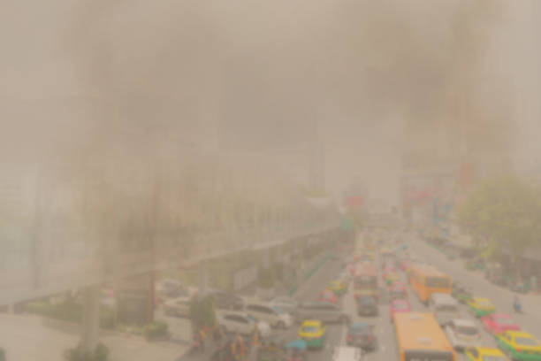 Pm2.5 dust pollution in cities and cars blur stock photo
