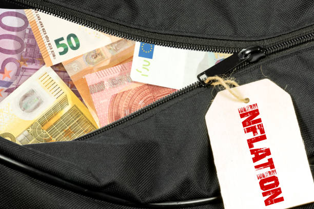 A pocket of euro money and hint sing of inflation stock photo