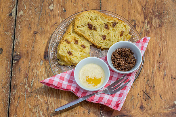 Poffert, traditional dutch cake from Groningen Poffert, traditional dutch cake from Groningen, served with brown sugar and melted butter groningen city stock pictures, royalty-free photos & images