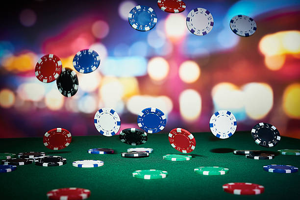 Poker chips Poker chips on table in casino gambling chip stock pictures, royalty-free photos & images