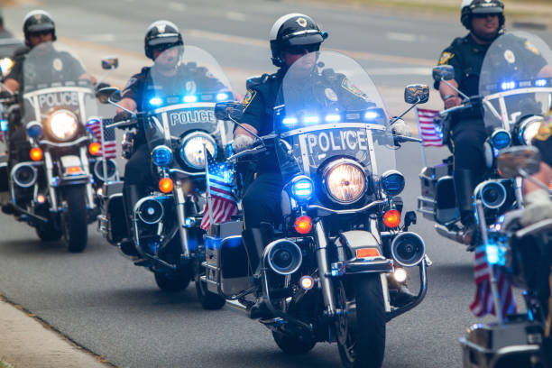 police-on-motorcycles-provide-escort-for-bikers-at-charity-ride-picture-id920504428