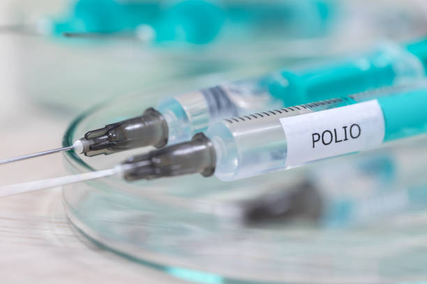 полиомиелит вакцинации шприц фон - polio стоковые фото и изображения