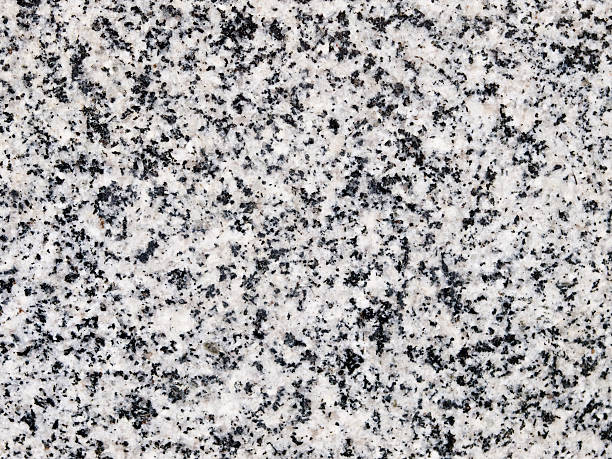 Polished granite texture Detail of the polished granite texture granitic stock pictures, royalty-free photos & images