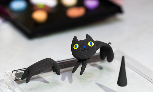 Polymer clay animals: kittens, black cats