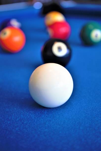 pool balls on a table pool balls on a table cue ball stock pictures, royalty-free photos & images
