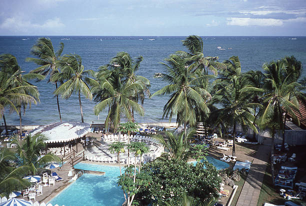 Pool Coconut Trees seashore Bamburi Beach Mombassa Kenya East Africa stock photo