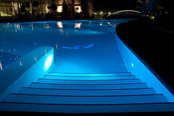 Poolside at night stock photo