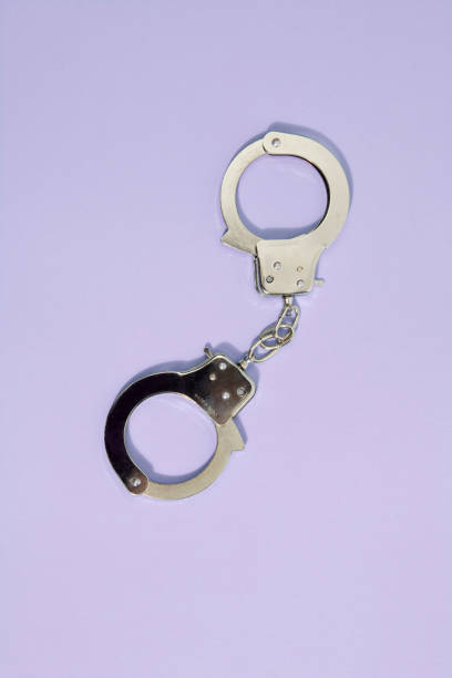 Pop handcuffs stock photo