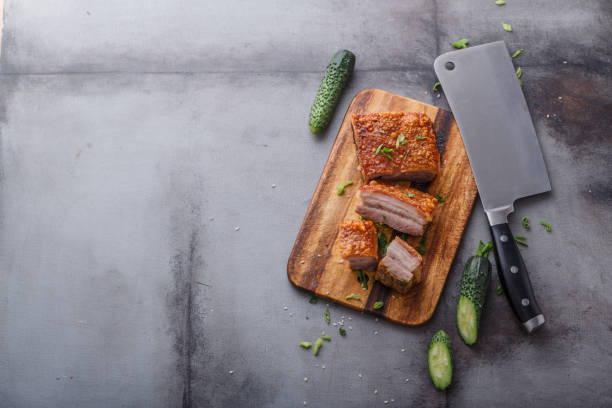 Pork belly with crispy skin copy space, top view stock photo