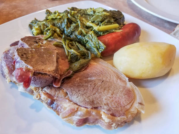 Pork shoulder with rapini Cooked pork shoulder with rapini, sausage and potatoe, traditional galician recipe broccoli rabe stock pictures, royalty-free photos & images