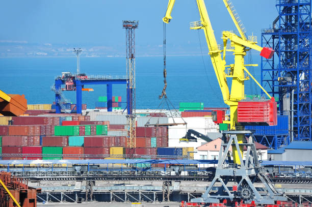 Port cargo crane and container stock photo