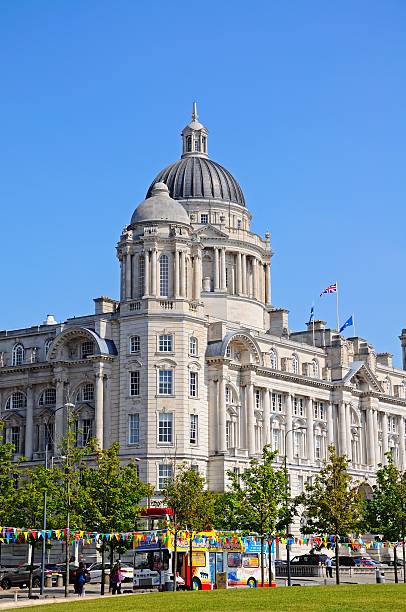 Port of Liverpool building. Liverpool, United Kingdom - June 11, 2015: Port of Liverpool Building formerly known as the Mersey Docks and Harbour Board Office at Pier Head with tourists enjoying the sights, Liverpool, Merseyside, England, UK, Western Europe. liverpool docks and harbour building stock pictures, royalty-free photos & images