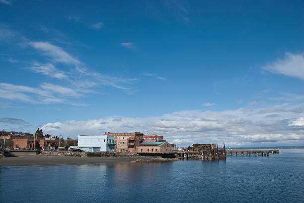 Port Townsend Waterfront Port Townsend, Washington, USA - March 21, 2010: The historic waterfront and Port Townsend Bay are pictured on a sunny day. jeff goulden washington state stock pictures, royalty-free photos & images