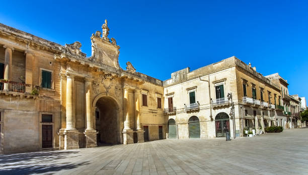 Porta San Biagio at the Piazza d'Italia in Lecce Apulia Italy Porta San Biagio at the Piazza d'Italia in Lecce Apulia Italy lecce stock pictures, royalty-free photos & images