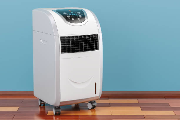 Portable Air Conditioner in room on the wooden floor, 3D rendering stock photo