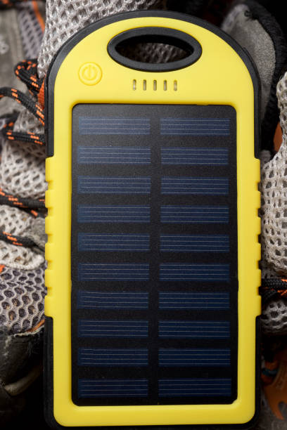 Portable solar device Portable solar cell for nature excursions. solar wireless power bank stock pictures, royalty-free photos & images