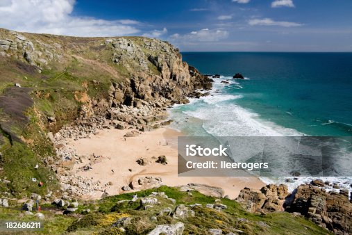 istock Porth Chapel beach near Porthcurno with Atlantic waves in Cornwall 182686211